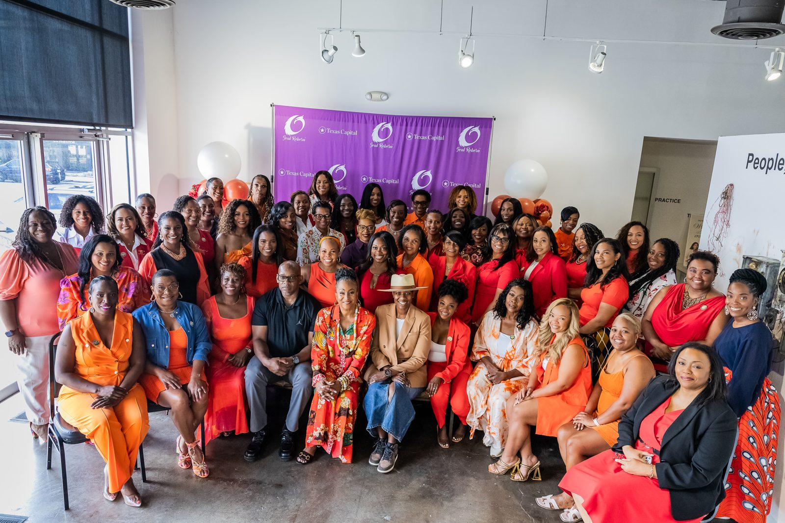 Cohort 1 graduates and leaders in a group photo