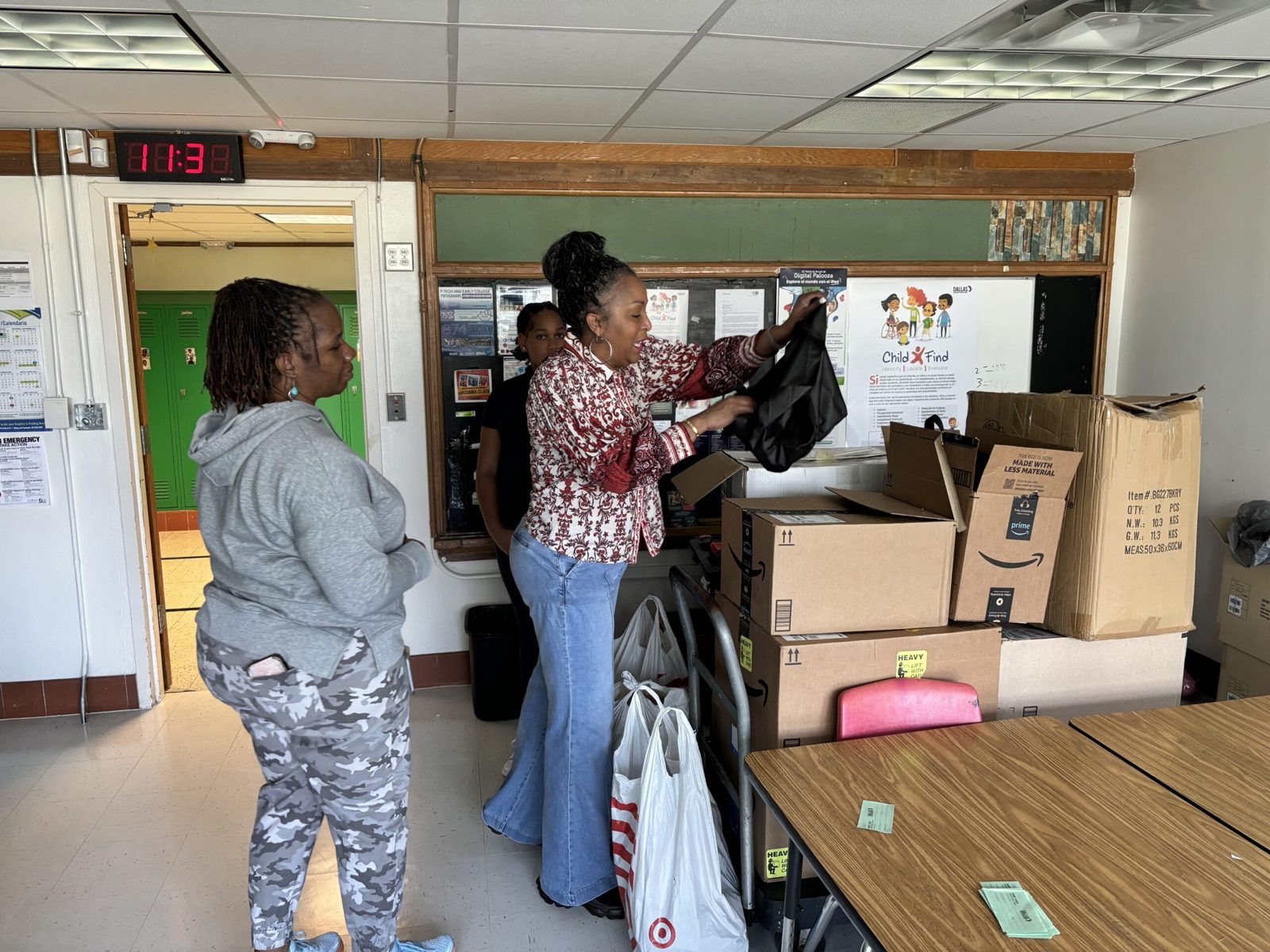 Unpacking donated supplies in a school classroom